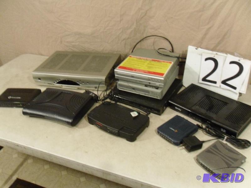 lot 22 image: Lot of Assorted Electronics. Several Modems, ...