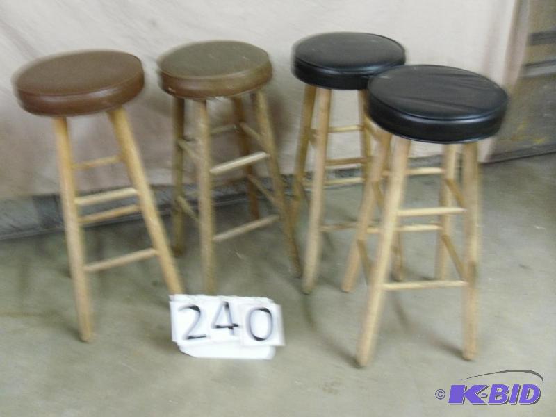 lot 240 image: 4 stools. Conditions vary. 2 black, 2 brown. ...