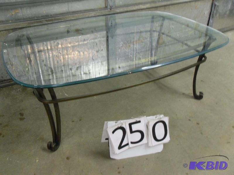 lot 250 image: Large glass  metal coffee table. Approx. 48&...
