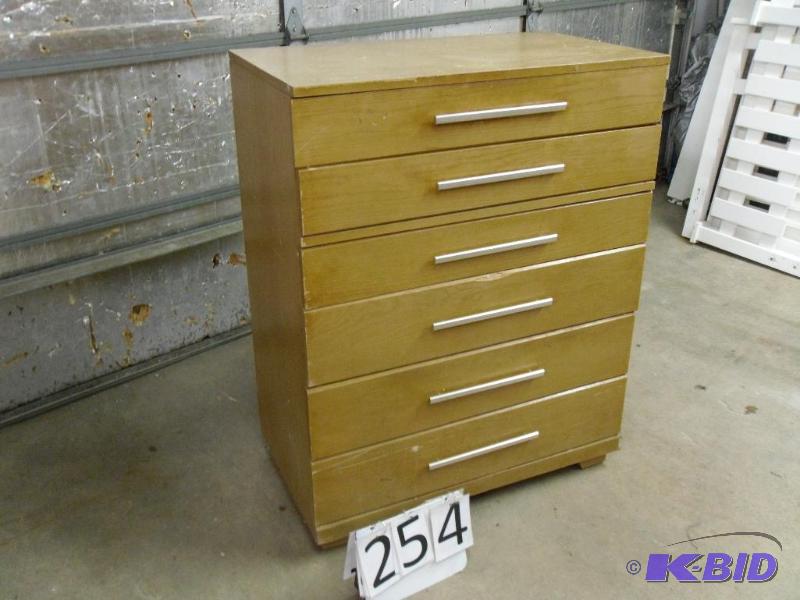 lot 254 image: 6 drawer dresser. Wear and tear. One side is ...