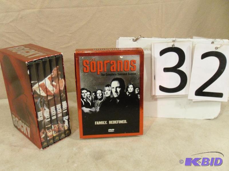 lot 32 image: DVD box sets. Rocky 5 disc set, Sopranos 4 di...