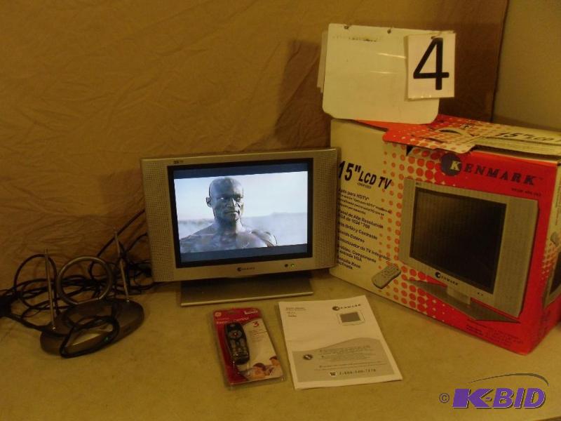 lot 4 image: Kenmark 15" LCD TV. Tested and works. Co...