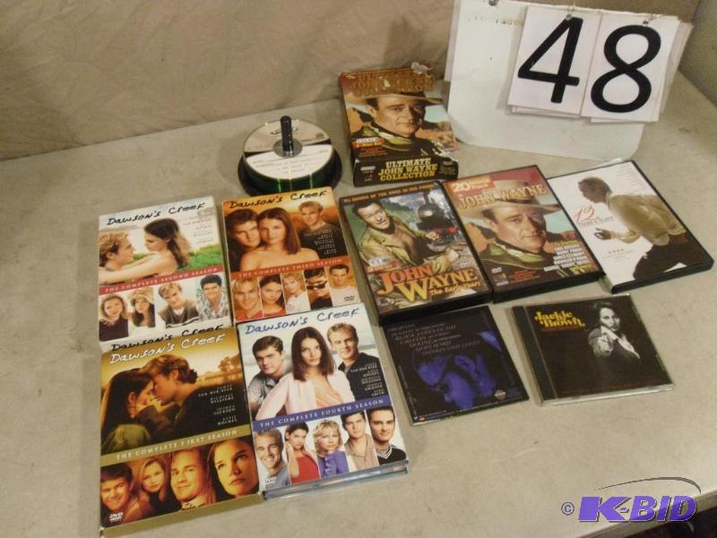 lot 48 image: Lot of Assorted Dvds and Blank CDs. Some may...