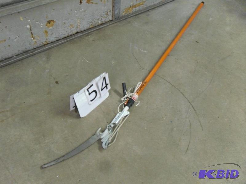 lot 54 image: Fiskars Pole Saw  Pruner. Pole extends for h...
