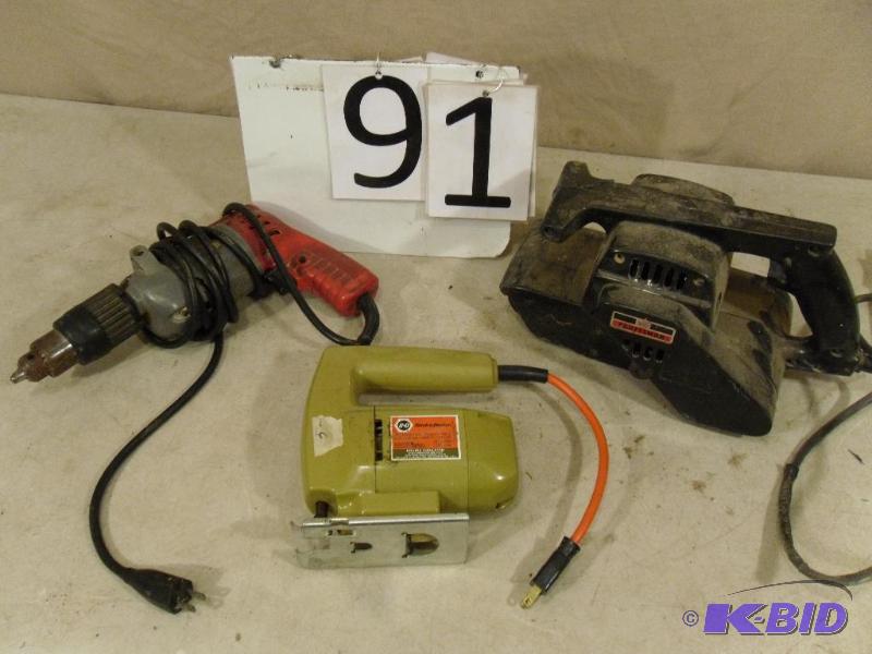 lot 91 image: Power tools. Milwaukee drill, Craftsman belt ...