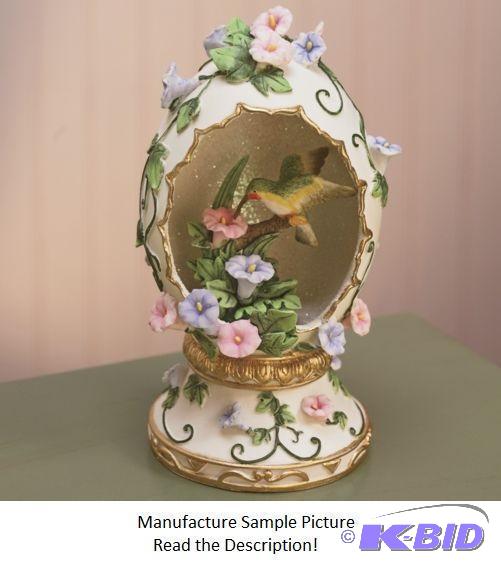 lot 70 image: Decorative Hummingbird Egg - A hummingbird si...