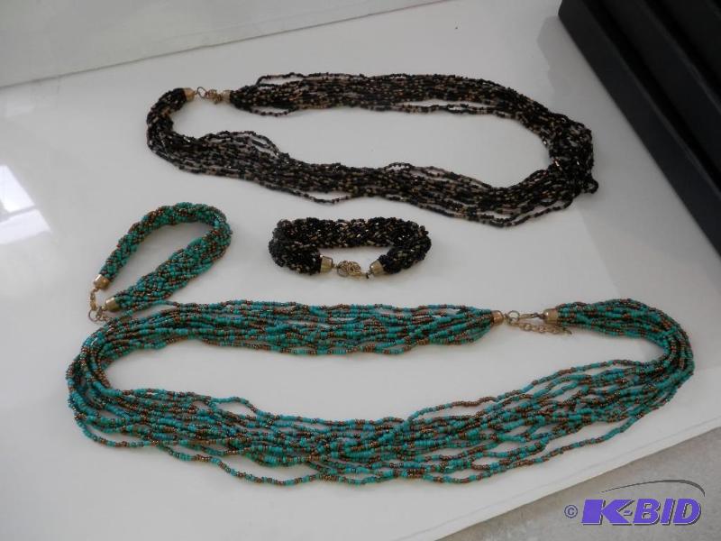 lot of 6 sets of one blue and one black necklace and bracelet
