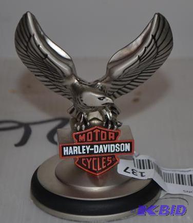 lot 137 image: Harley Davidson metal Eagle 3" tall...