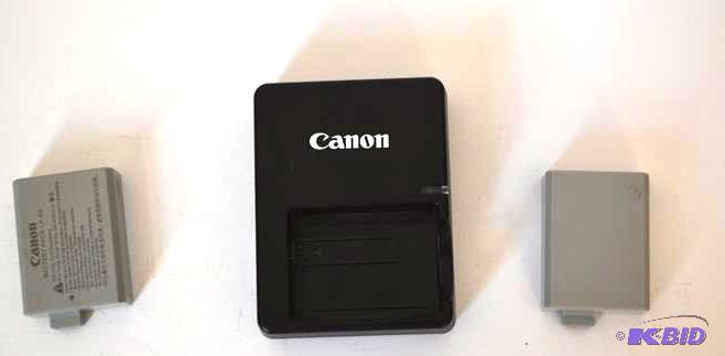 lot 176 image: Canon Rebel camera compatible, 2 batteries an...
