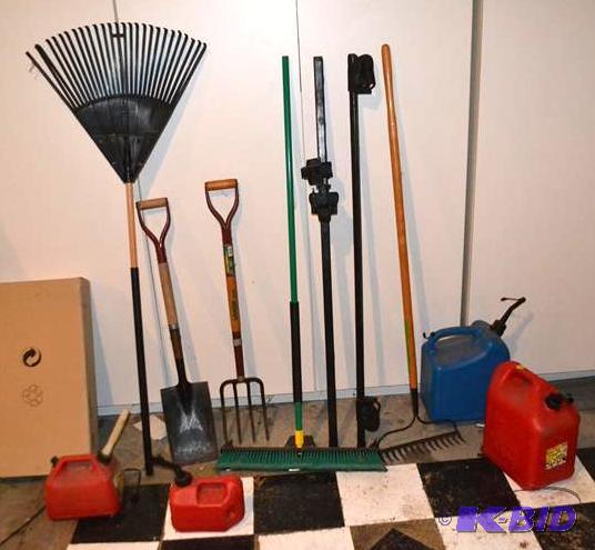 lot 198 image: Yard tools and plastic gas cans appears to be...