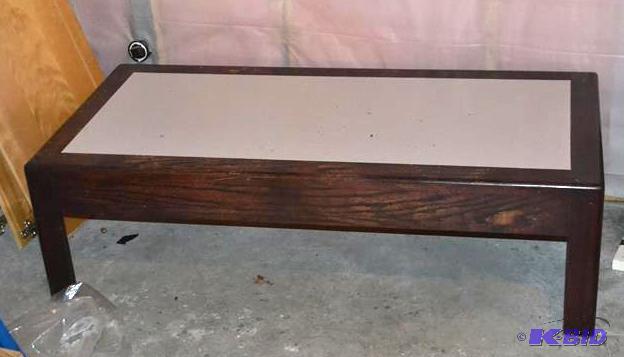 lot 201 image: Wood coffee table 54x26x16" Located on l...