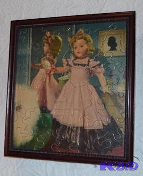 lot 209 image: Vintage puzzle in a wood picture frame 10x10&...