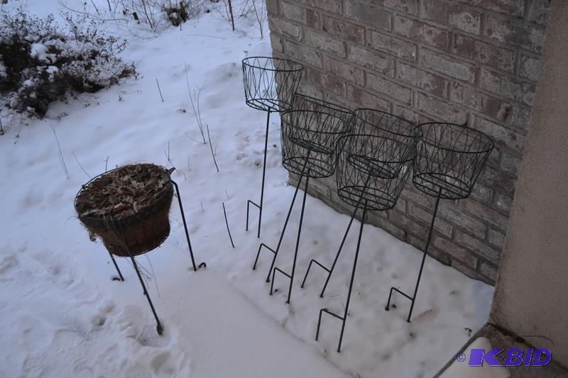 lot 212 image: metal Plant stands for the yard. 6 baskets to...