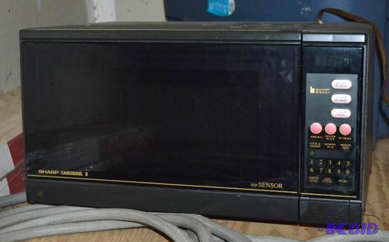lot 217 image: Microwave powered up but not tested- has rota...