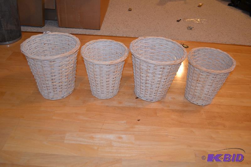 lot 39 image: Wicker basket planter, waste basket. The tall...