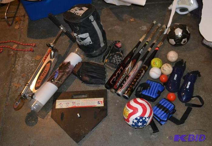 lot 52 image: Sports Equipment Bag of softballs 4 bats socc...