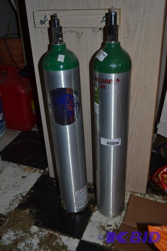 lot 58 image: Two medical oxygen tanks...