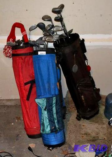 lot 73 image: 3 golf bags and clubs Trail 5 Pak Front 9...