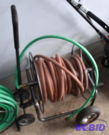 lot 33 image: Garden Hose reel cart - Four wheeled hose car...