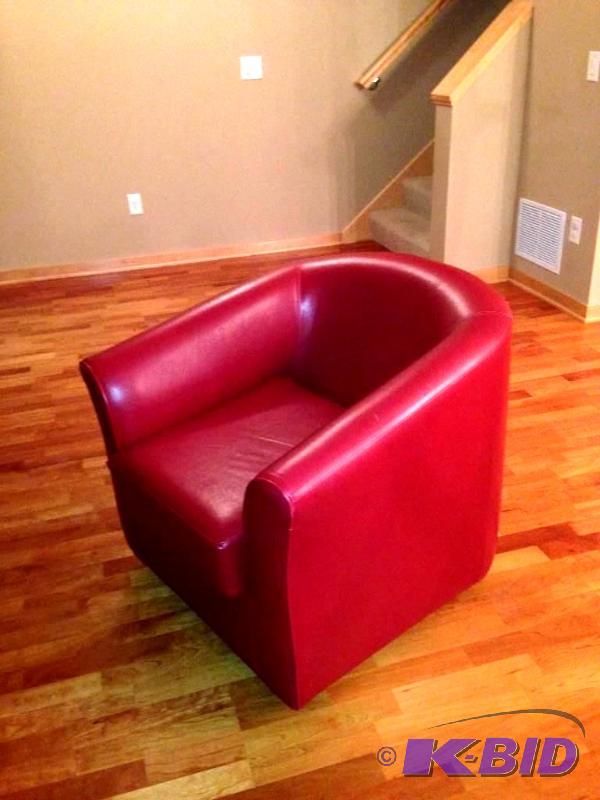lot 39 image: Modern Red Swivel Chair...