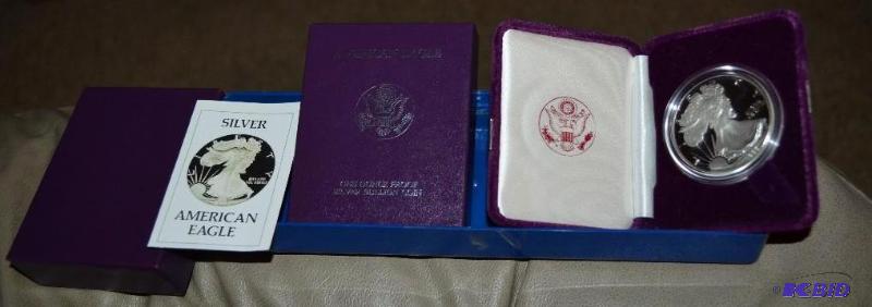 lot 40 image: 1986 1 OZ Silver Dollar Proof Bullion Coin wi...