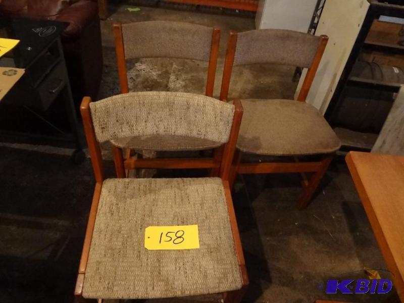 Four Clothwood Chairs