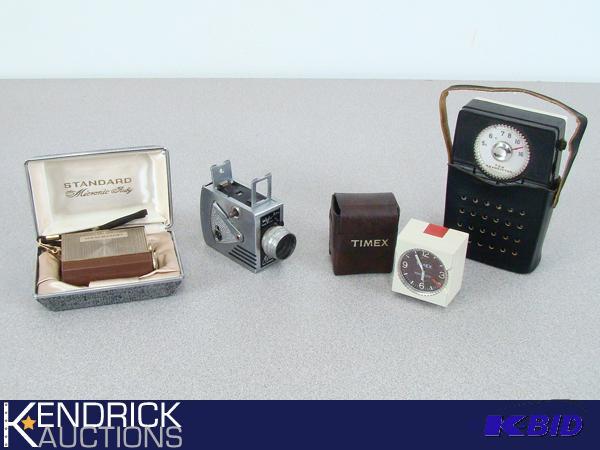Standard Micronic Ruby Transistor Radio, Universal Minute 16, Timex Mini-Alarm, and Ten Transistor