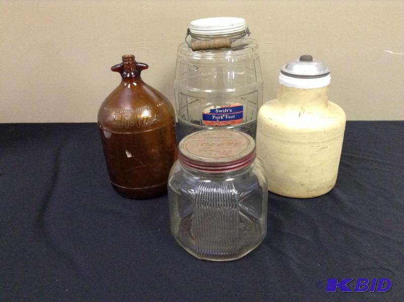 lot 49 image: Lot of four vintage jarsjugs