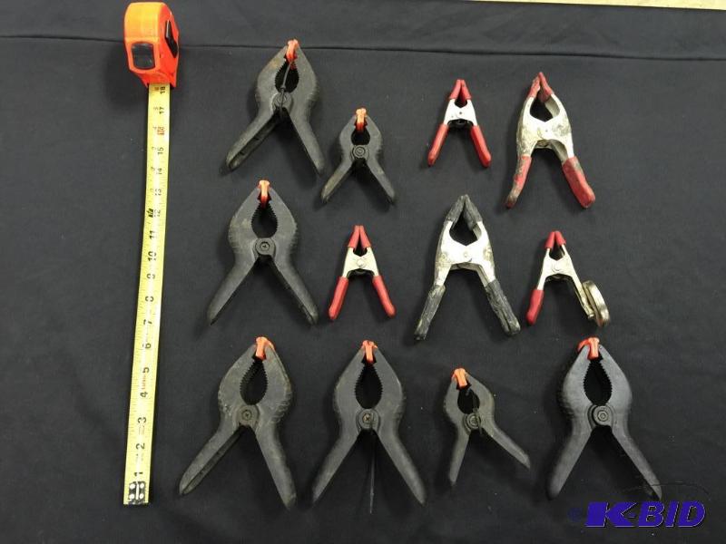 lot 35 image: 12 Plastic And Metal Spring Clamps