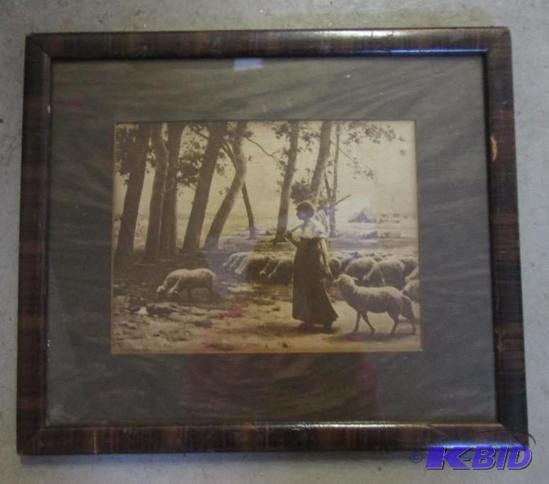 lot 32 image: 11in x 13in framed picture of woman and sheep...
