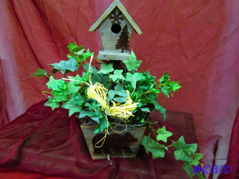 lot 46 image: Decorative Bird house with greens  wood with ...