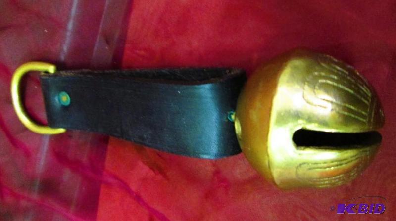 lot 71 image: Thick jingle bell on leather strap...
