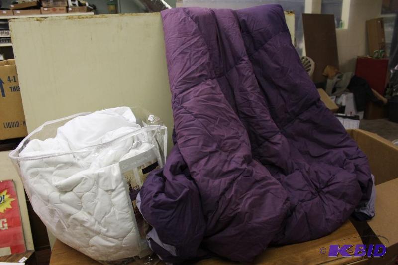 lot 530 image: Down Comforter and Mattress Pad, appear to be...