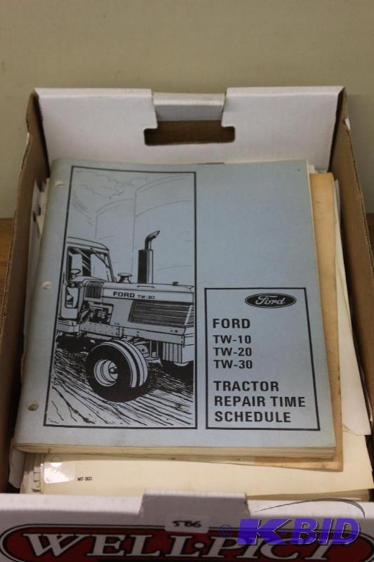 lot 586 image: Ford Tractor book, etc.. ...