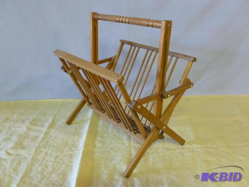 Nice wooden fold up magazine rack....