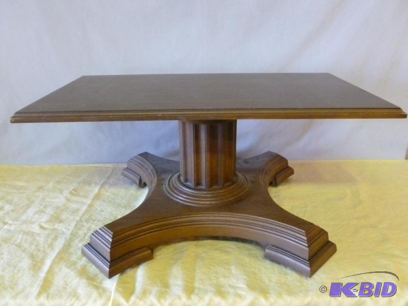 Wooden pedestal style roller wheel coffee tab...