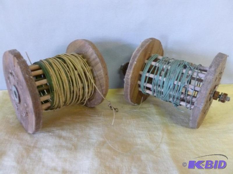 Lot of two wooden rattle fishing reels.&nbsp...
