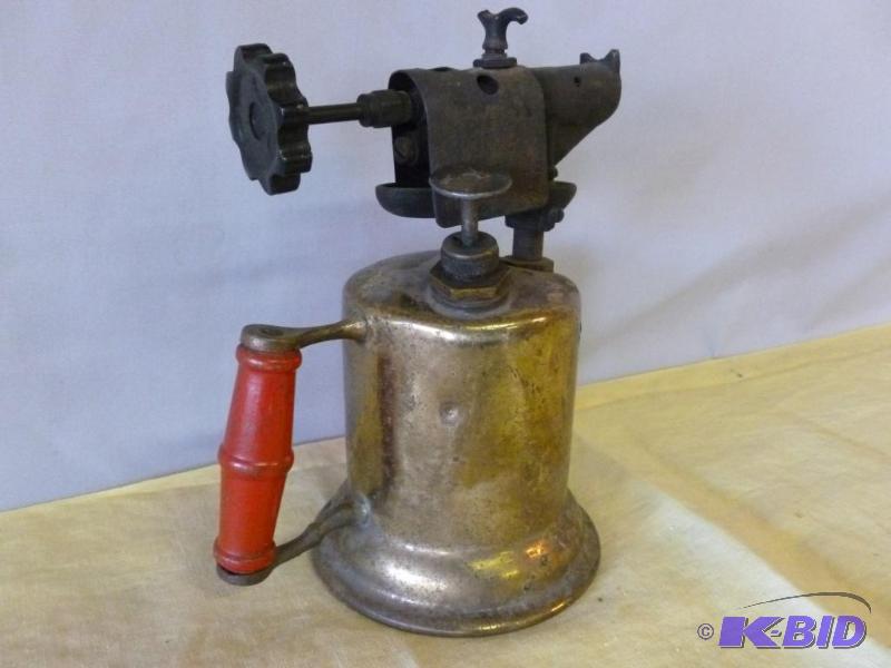 Vintage red wood handled brass torch....