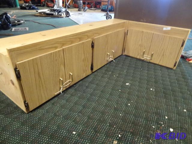 lot 18 image: L shaped overhead cabinet. 72 x 44 x 18...