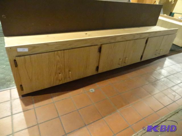 lot 21 image: Overhead cabinet. 94 x 17 x 19...