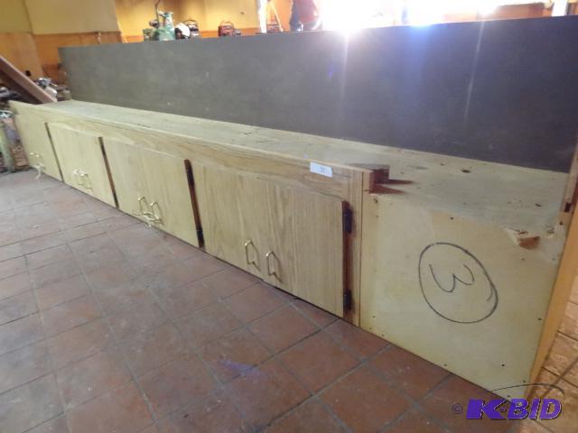 lot 22 image: Overhead cabinet. 125 x 16 x 19...