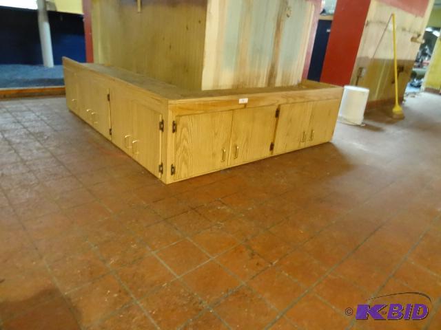 lot 24 image: L shaped overhead cabinet. 72 x 65 x 18...