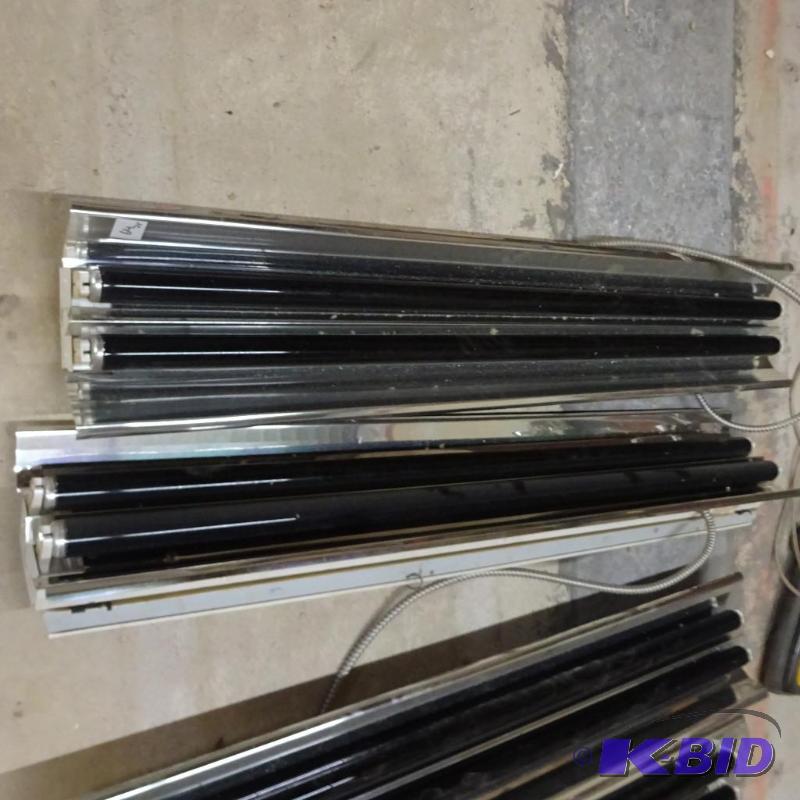 lot 64 image: 2 fluorescent lights. Black bulbs. 48"...