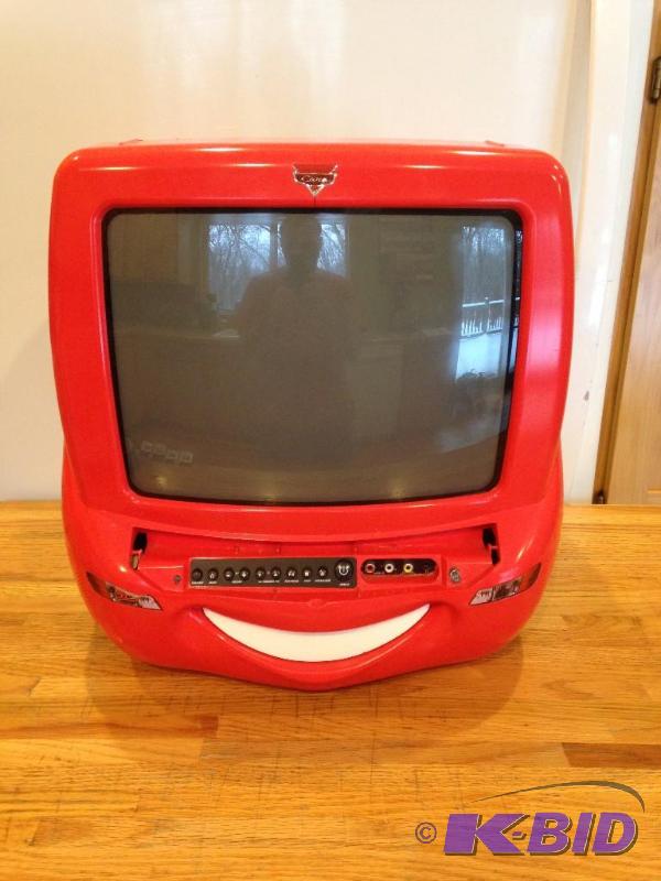 lot 26 image: Lightning McQueen TV and DVD with Remote