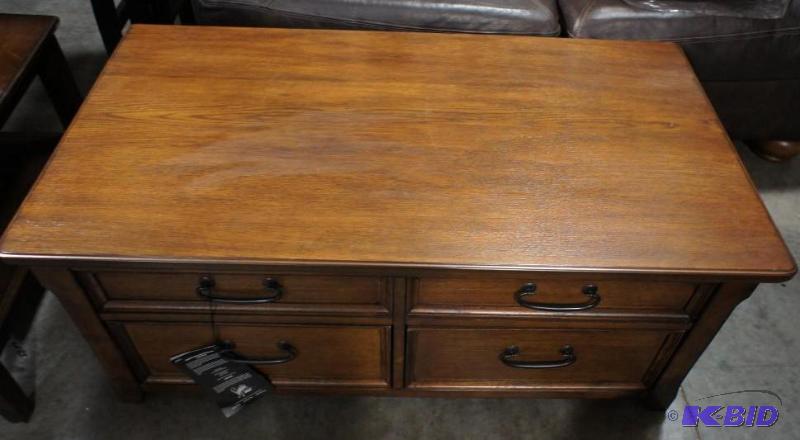 New Ashley Signature Furniture Coffee Table -...