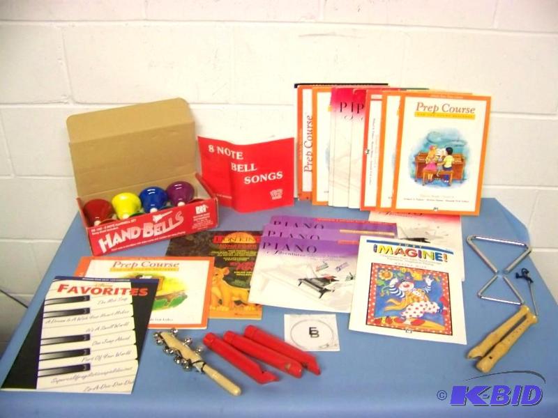 lot 20 image: Large lot of MusicPiano Books (some Vintage) and Kids Instruments