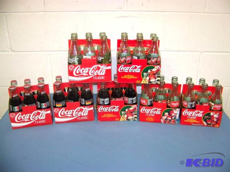 lot 23 image: (7) VintageCollectible, Coca-ColaCoke Bottle 6-Packs and Carriers