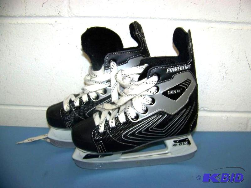 lot 3 image: CCM, Kids Hockey Skates with Skate Guards