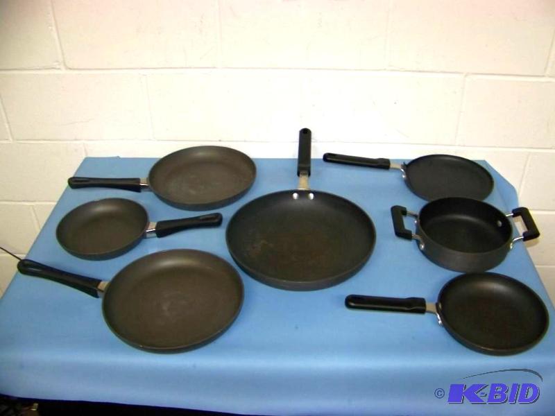 lot 9 image: (4) Calphalon Pans and (3) ScanPan Pans