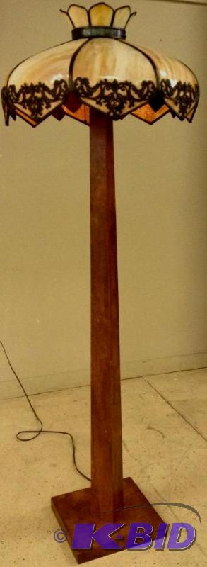 lot 15 image: Vintage Mission floor lamp with Tiffany style shade.